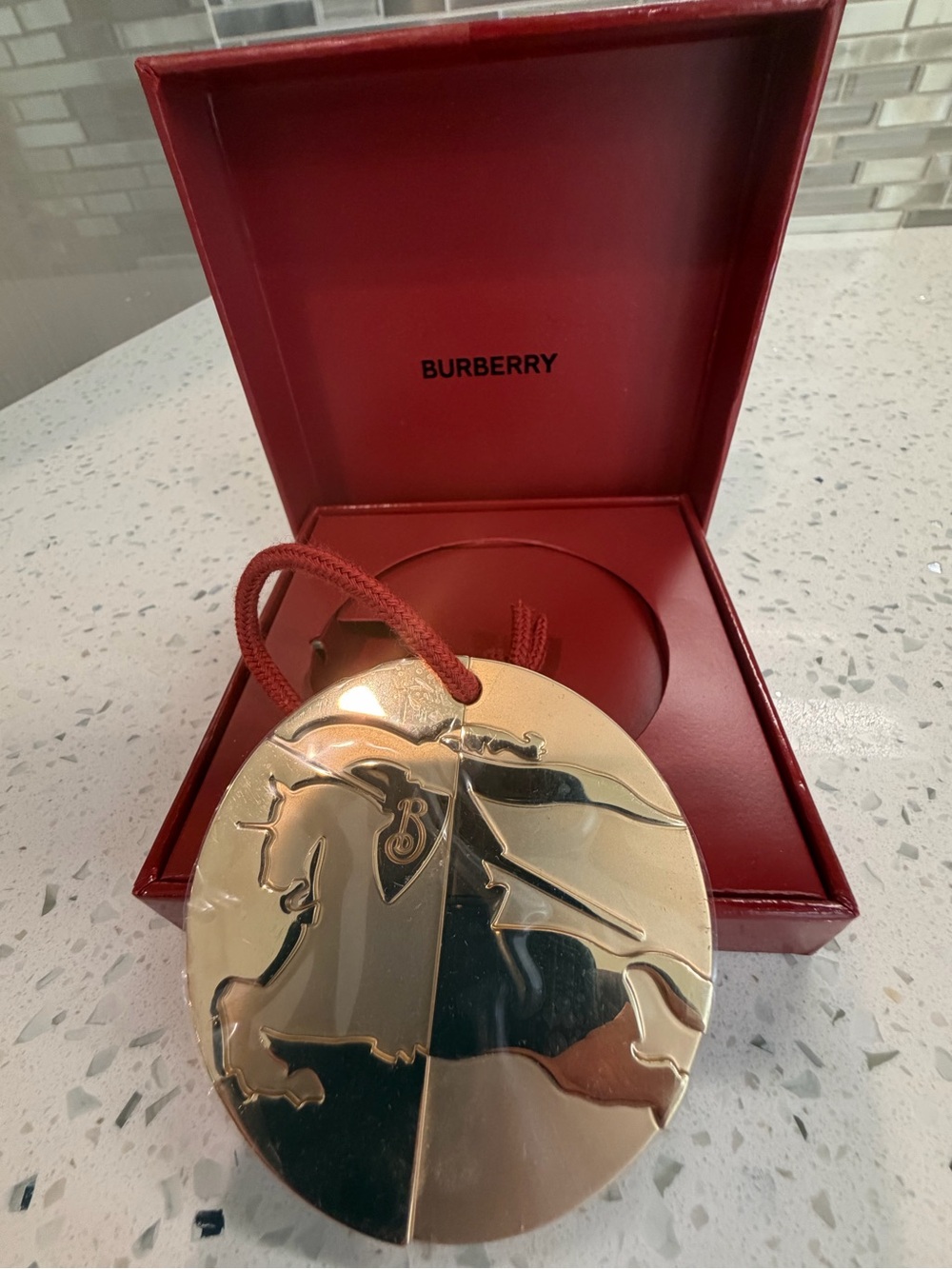 Burberry Gold Round Equestrian Holiday Ornament with Red Cord